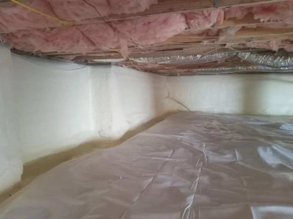 Crawl space encapsulation with closed-cell spray foam for Storm Damage Roof Repair in The Village